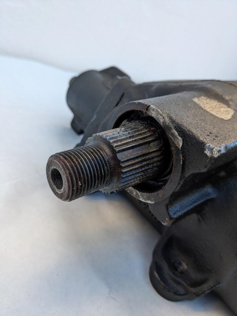 USED GENUINE FORD STEERING GEAR BOX E4AC3A587A R14