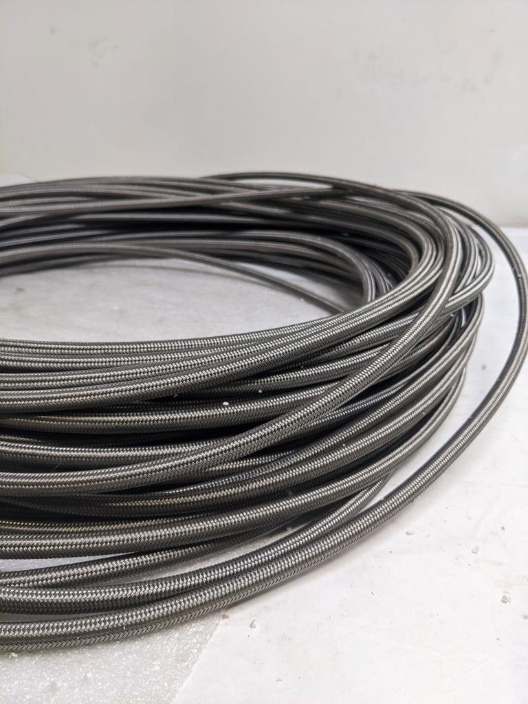UNBRANDED BRAIDED 210' SS HOSE 5/16" ID 7/16" OD W/ PLASTIC TUBING NEW R17