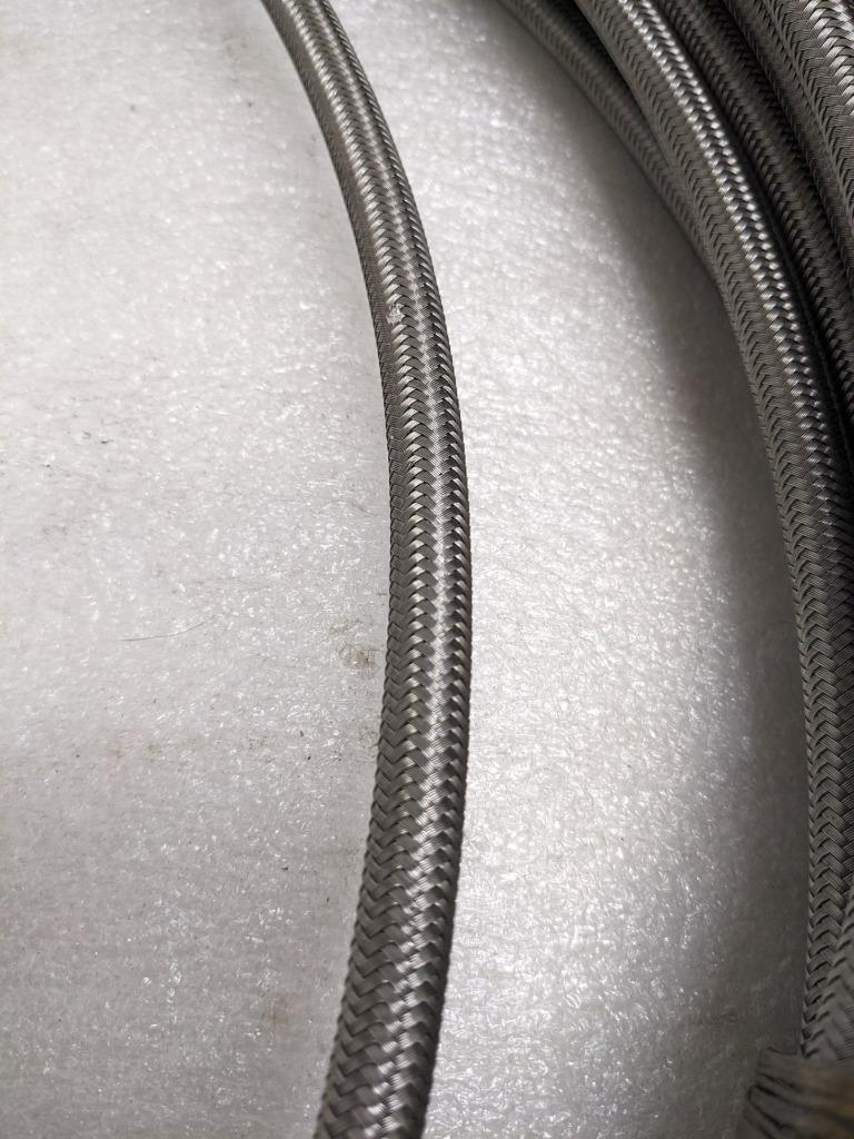 UNBRANDED BRAIDED 223' SS HOSE 5/16" ID 7/16" OD W/ PLASTIC TUBING NEW R5