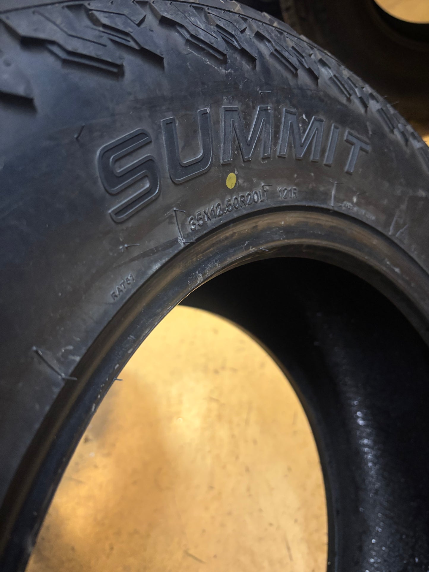 DTO 15/32” SUMMIT TRAIL CLIMBER AT02 BSW LT 35 12.5 20 121R LRE 10 PLY ALL TERRAIN TIRE 20920 DEALER TAKE OFF