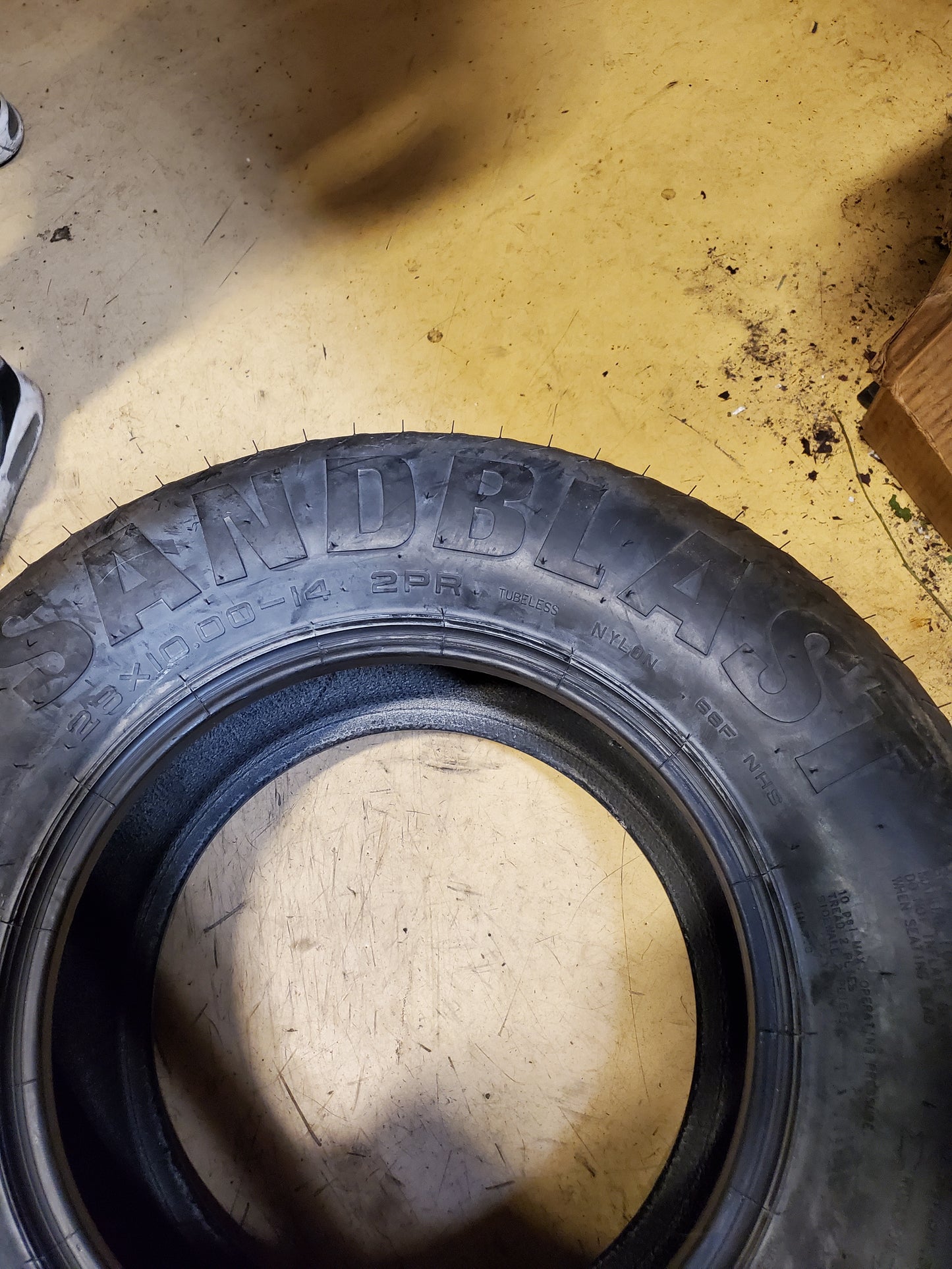 NOS CST SANDBLAST BSW 28 10 14 2PLY SAND TIRE TM00732200