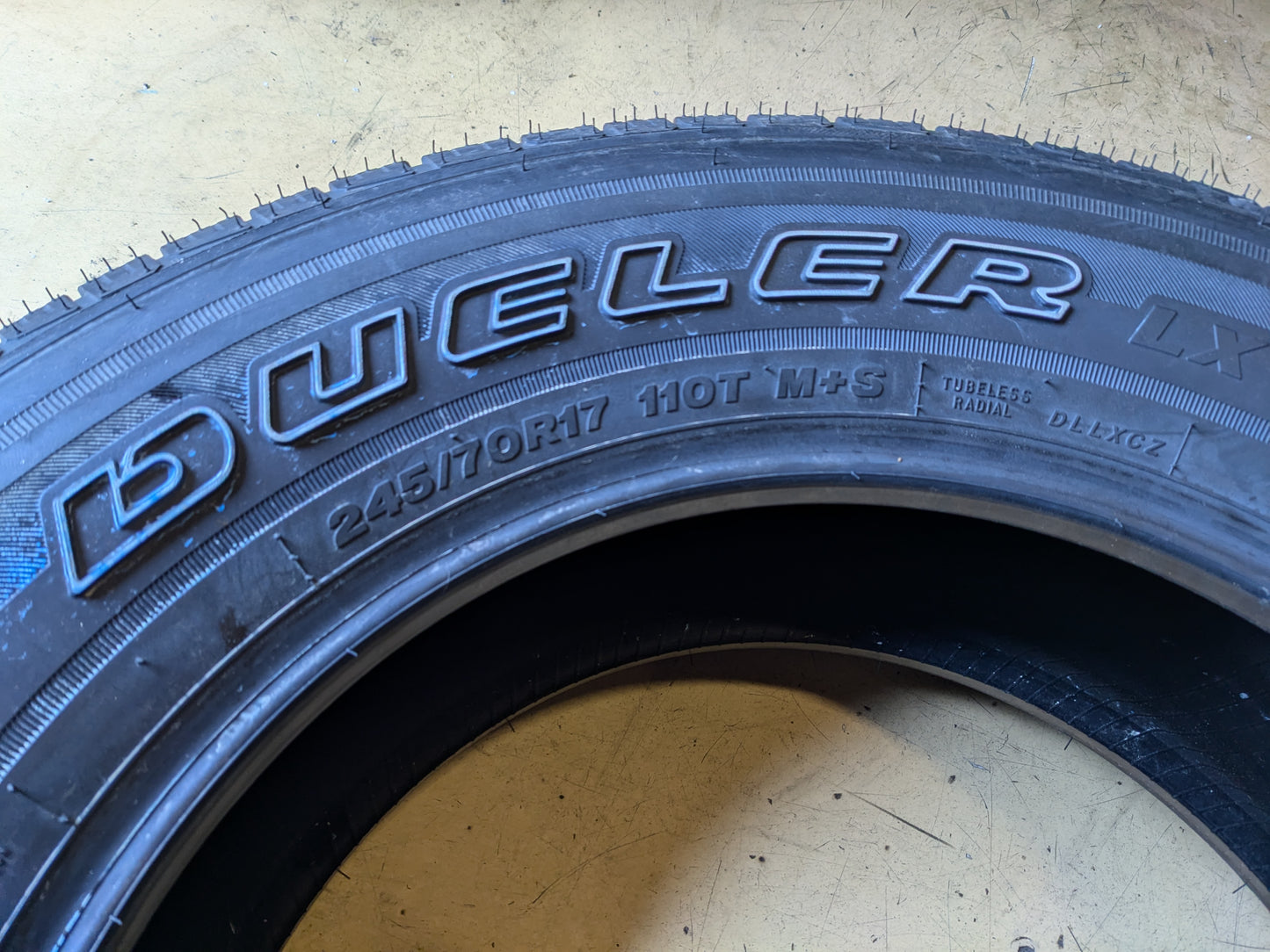 BRIDGESTONE DUELER LX OWL P 245 70 17 110T SL ALL SEASON TIRE 009404