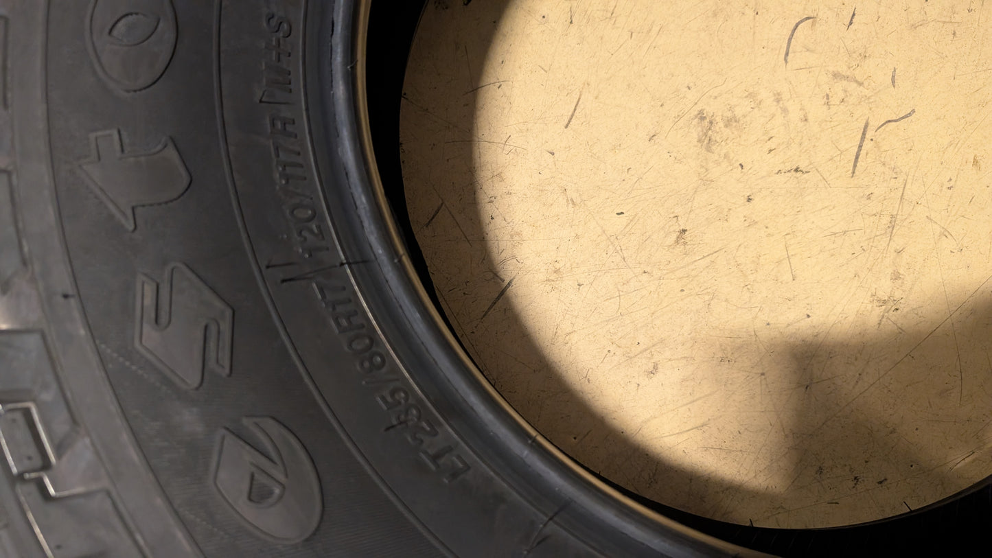 FIRESTONE TRANSFORCE AT2 BSW LT 235 80 17 120/117R ALL TERRAIN TIRE 000185