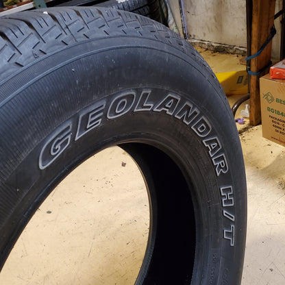 USED 11.5 /32” OF 13/32” YOKOHAMA GEOLANDAR H/T G056 WL P 265 70 18 114S SL HIGHWAY TERRAIN TIRE 110105623