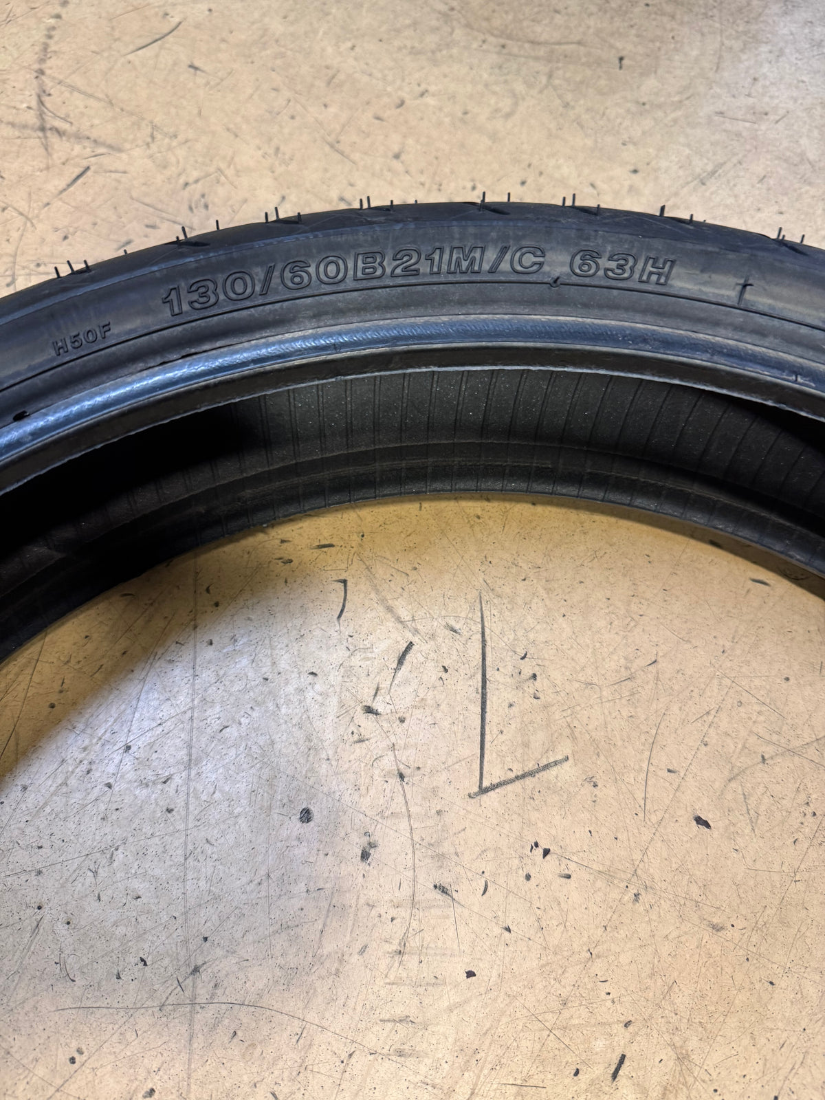 BRIDGESTONE BATTLECRUISE H50 BSW 130 60 21 63H FRONT MOTORCYCLE TIRE 009090