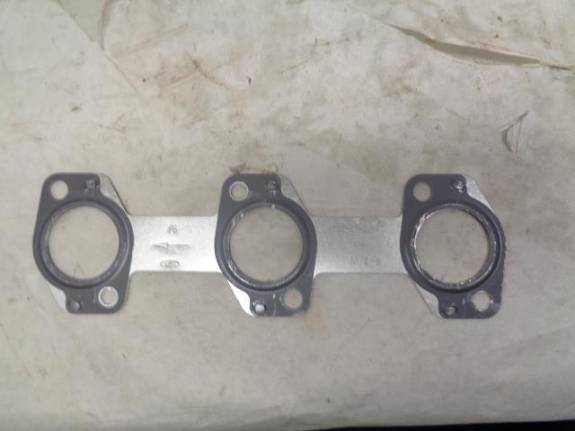 SET OF FORD HEAD AND MANIFOLD GASKETS 4C3E-6051-DB NEW J2