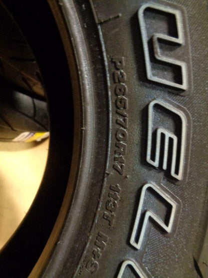 1 NEW BRIDGESTONE DUELER A/T REVO 3 OWL 265 70 17 113T ALL TERRAIN TIRE 000033