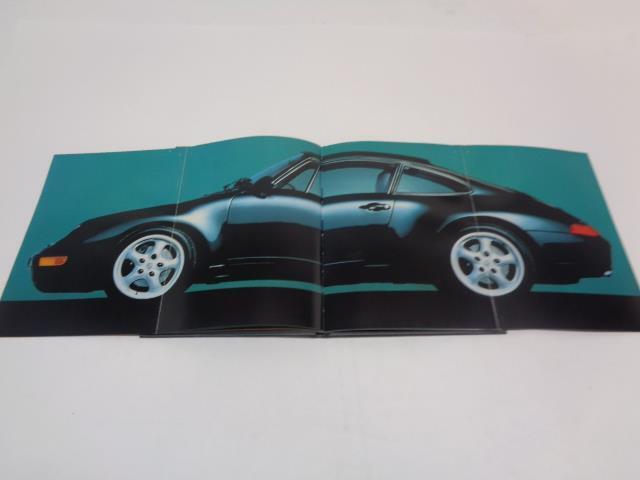 Porsche 911 "The New Carerra" Hardcover Brochure WVK 127 121 94 Genuine R25