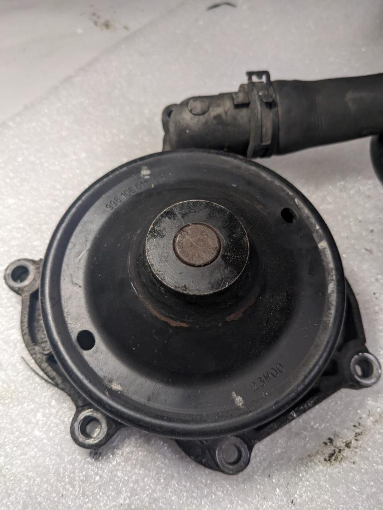 PORSCHE 911 997 BOXSTER CAYMAN ENGINE WATER PUMP W HOSES 99710601106 USED R20