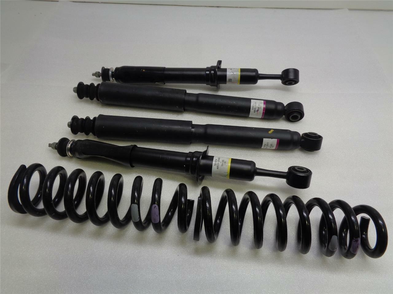 NEW SET OF GENUINE TOYOTA SHOCKS '09-'14 FJ CRUISER 48510-35400/48530-35211 R9