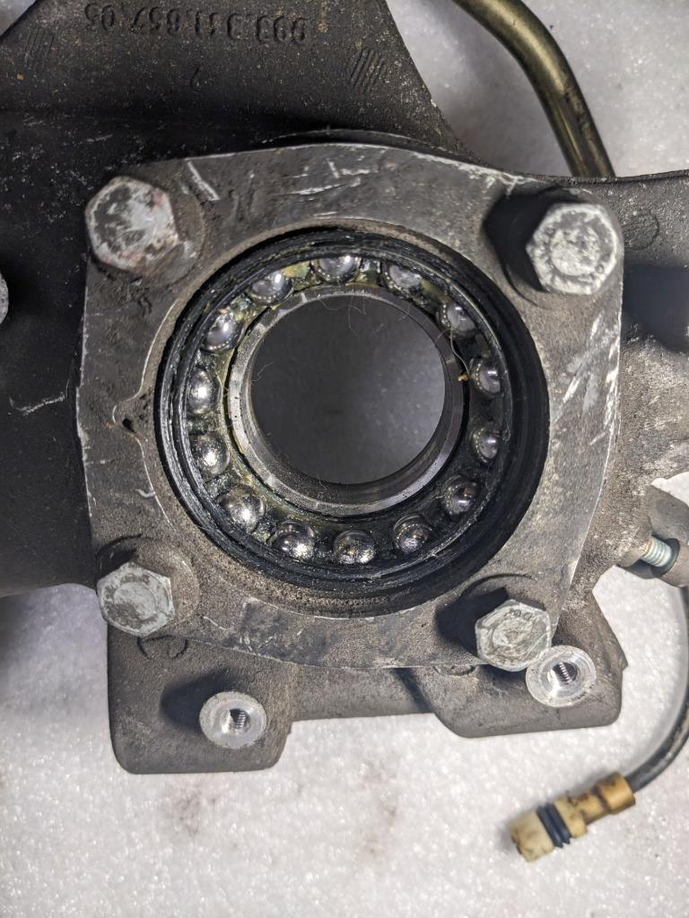 PORSCHE 993 OEM DRIVER SIDE STEERING KNUCKLE 99334165705 USED R20