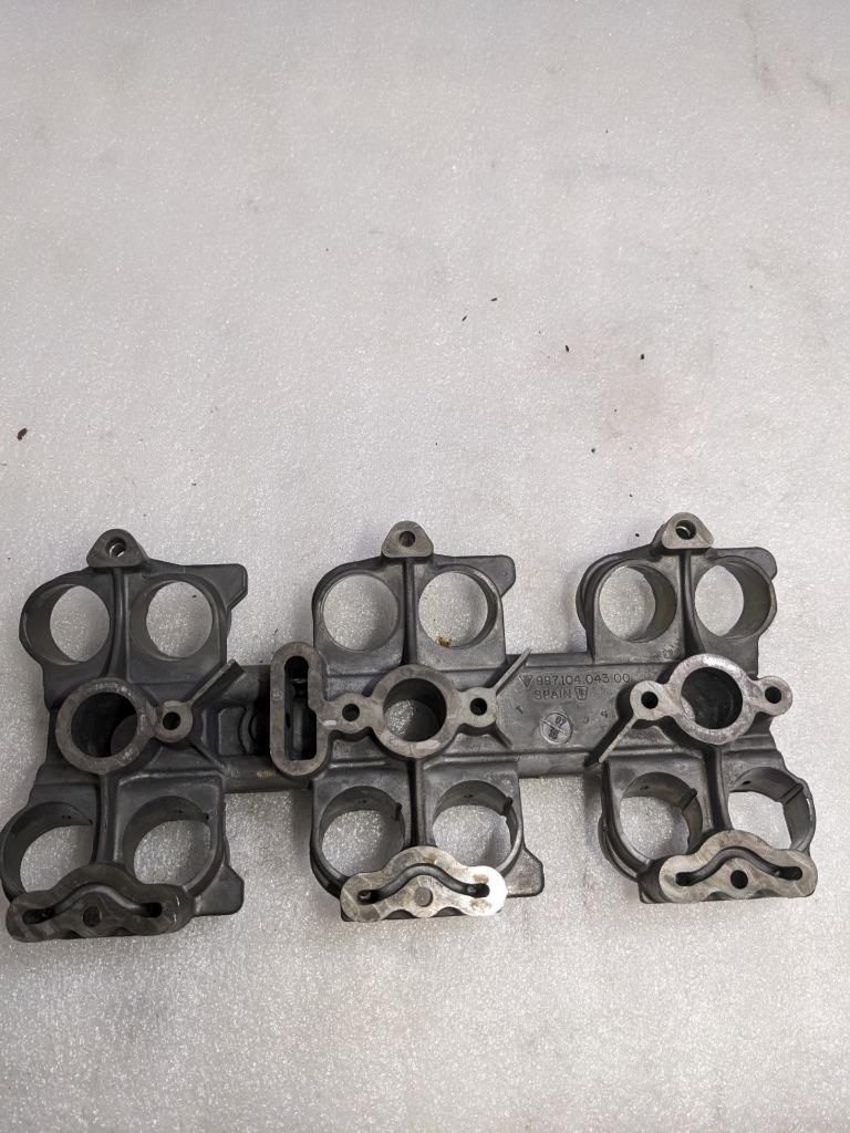 PORSCHE 911 BOXSTER PESTLE/TAPPET HOUSING 99710404300 USED 996B.GL