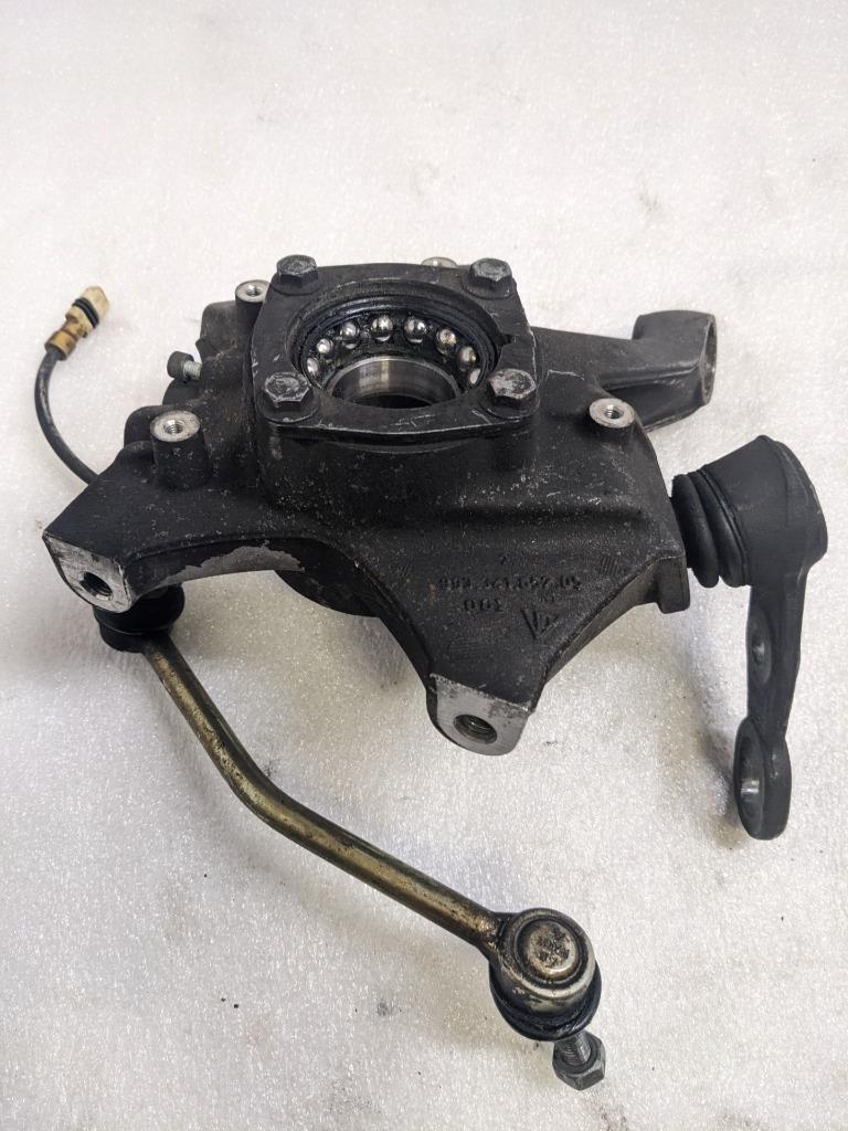 PORSCHE 993 OEM DRIVER SIDE STEERING KNUCKLE 99334165705 USED R20