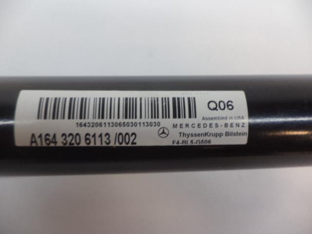 NEW GENUINE MERCEDES-BENZ FRONT SHOCK ABSORBER A164320611380 R35