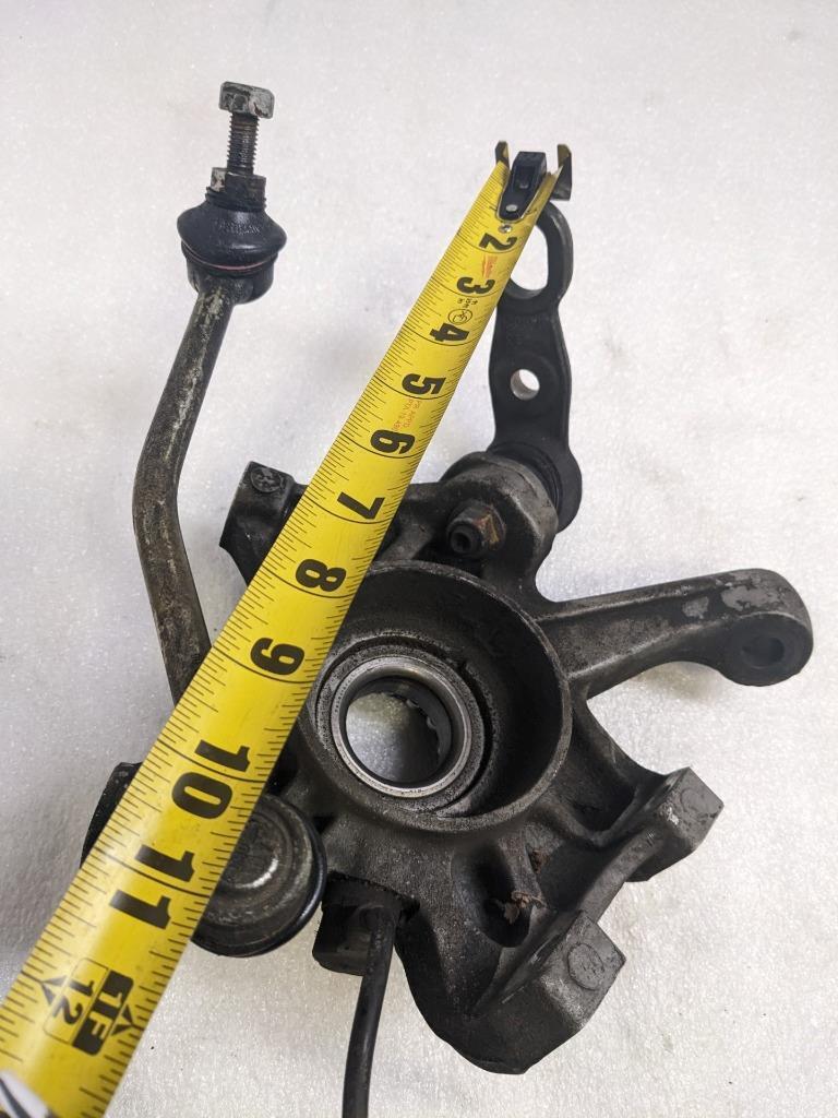 PORSCHE 993 OEM DRIVER SIDE STEERING KNUCKLE 99334165705 USED R20