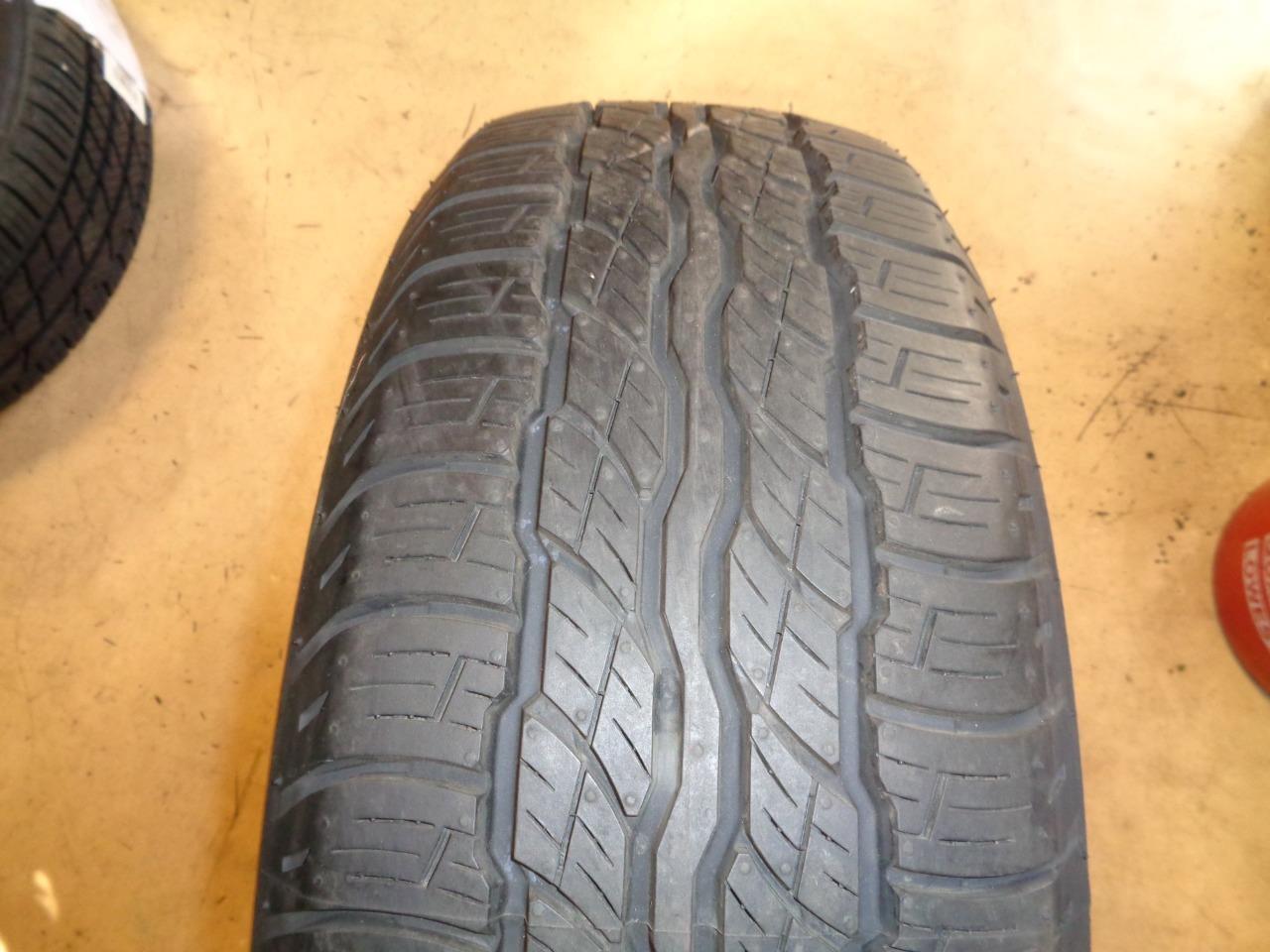 USED BRIDGESTONE DUELER H/T 687 P 235 55 18 100H SL TIRE 9.5/32" 001785 AQ4