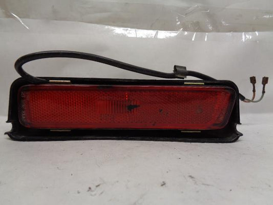 USED PORSCHE LEFT REAR SIDE MARKER w/ HOUSING ASSEMBLY 944 631 425 00 R25T4