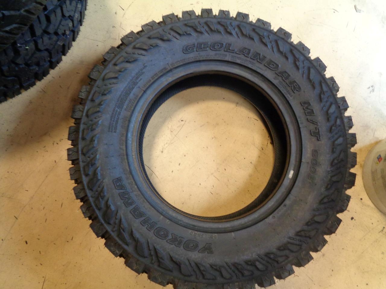 1 NEW TIRE YOKOHAMA GEOLANDAR MT G003 LT 215 75 15 100/97Q LRC 6PLY 33306