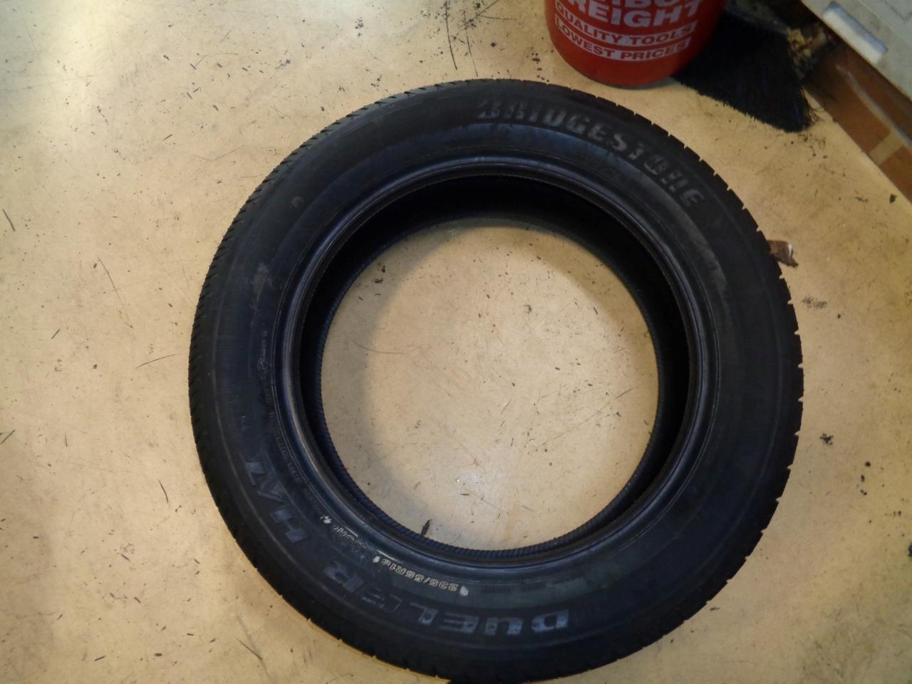 USED BRIDGESTONE DUELER H/T 687 P 235 55 18 100H SL TIRE 9.5/32" 001785 AQ4