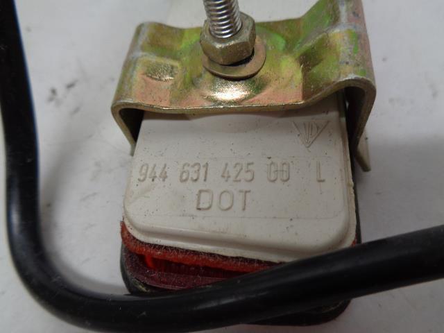 USED PORSCHE LEFT REAR SIDE MARKER w/ HOUSING ASSEMBLY 944 631 425 00 R25T4