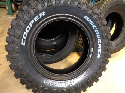 COOPER DISCOVERER STT PRO OWL LT 275 70 18 125 122P LRE 10PLY TIRE 170111034 BQ4
