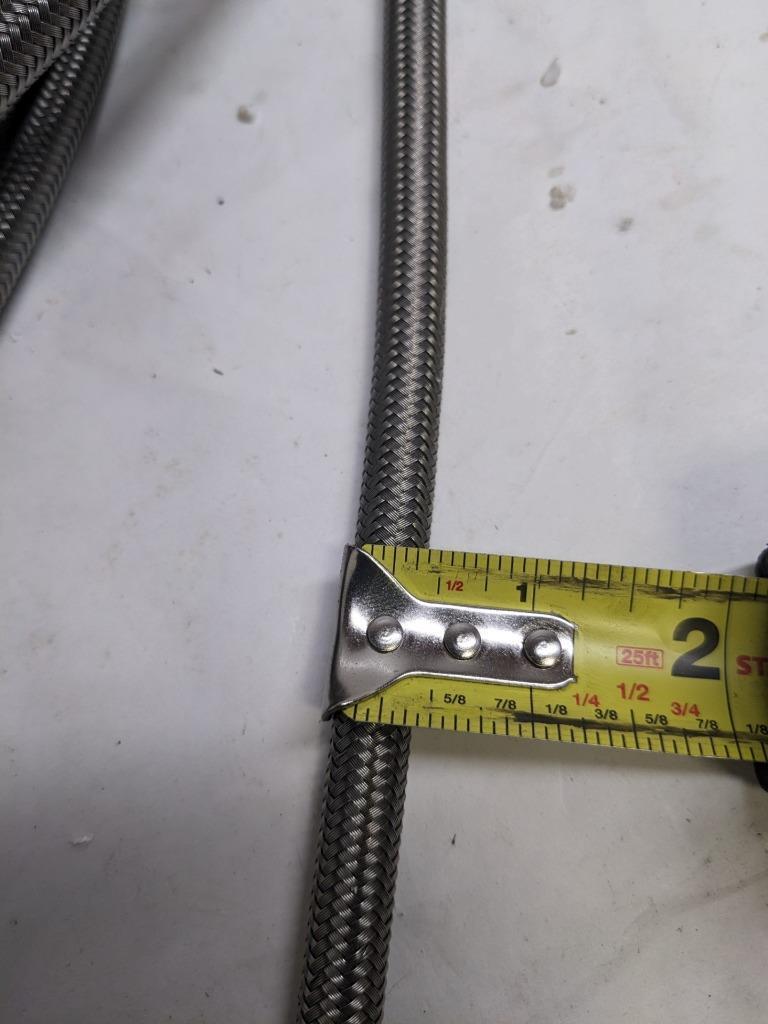 UNBRANDED BRAIDED 210' SS HOSE 5/16" ID 7/16" OD W/ PLASTIC TUBING NEW R17