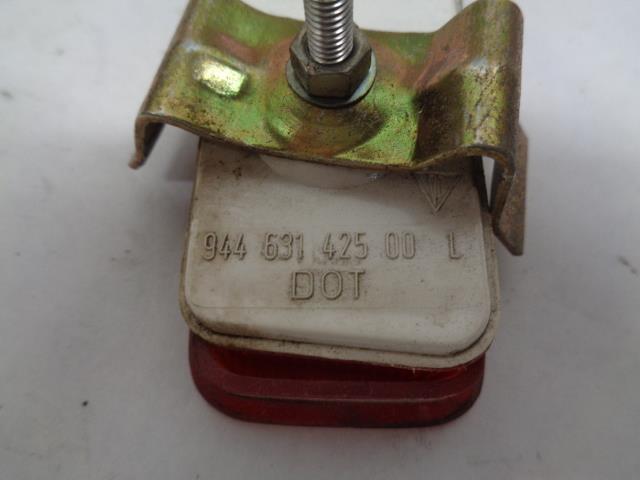 USED PORSCHE LEFT REAR SIDE MARKER w/ BACKING & HOUSING 944 631 425 00 R25T4