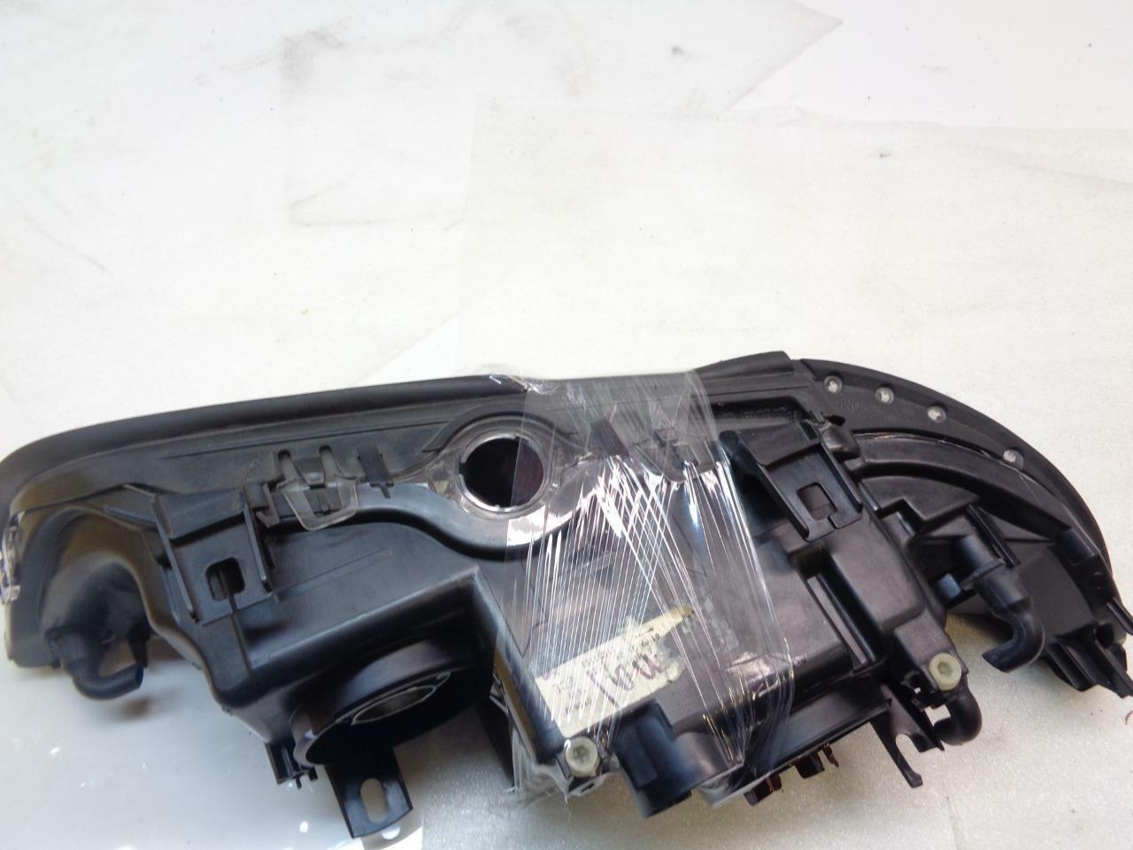 BMW 5 SERIES E39 OEM HELLA XENON HALO LAMP RIGHT NEW OEM DAMAGED FOR PARTS SR