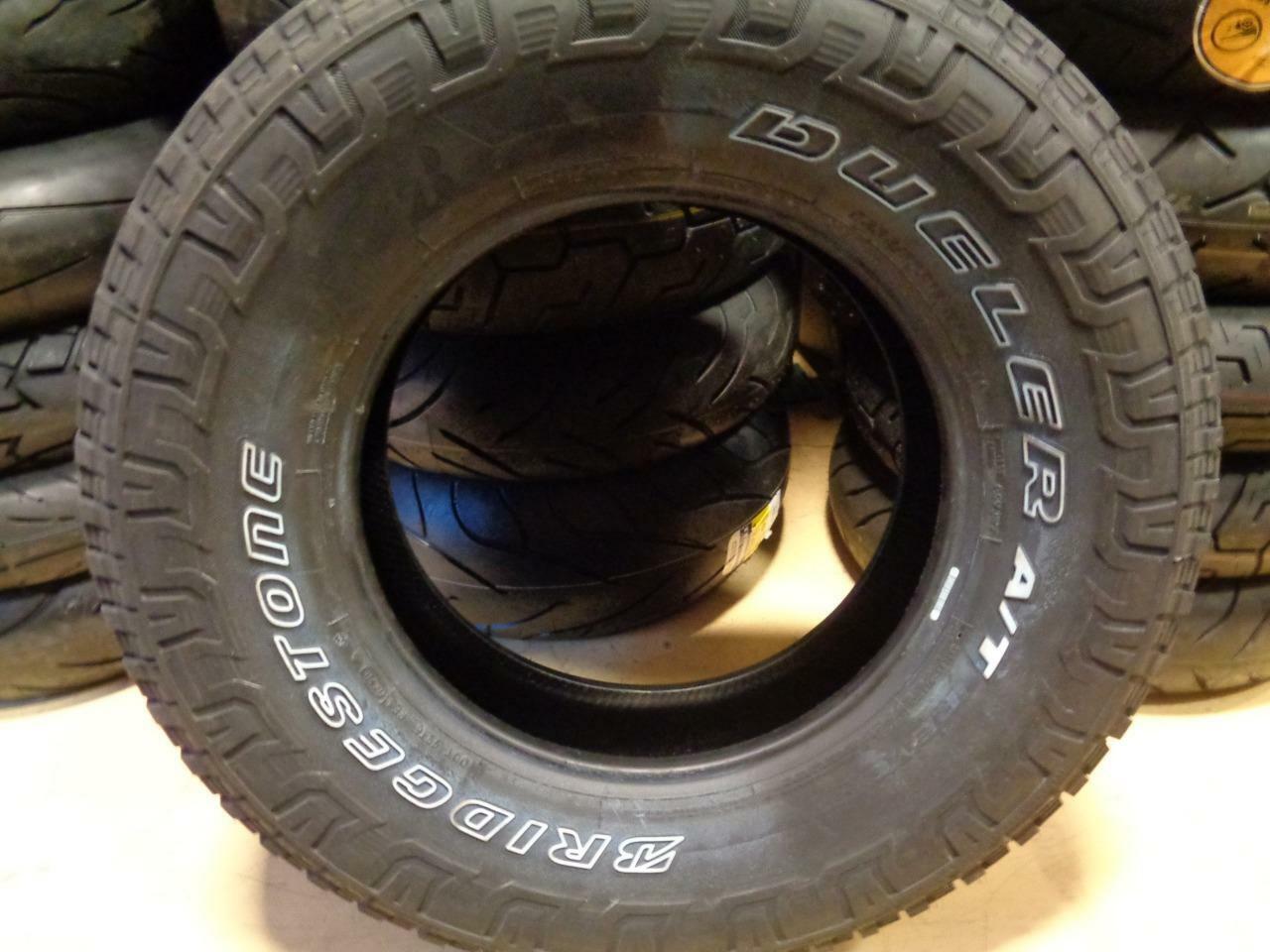 1 NEW BRIDGESTONE DUELER A/T REVO 3 OWL 265 70 17 113T ALL TERRAIN TIRE 000033