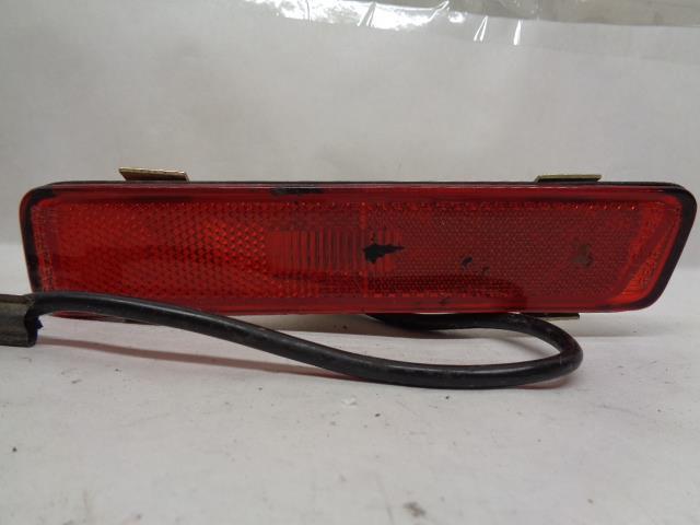 USED PORSCHE LEFT REAR SIDE MARKER w/ HOUSING ASSEMBLY 944 631 425 00 R25T4