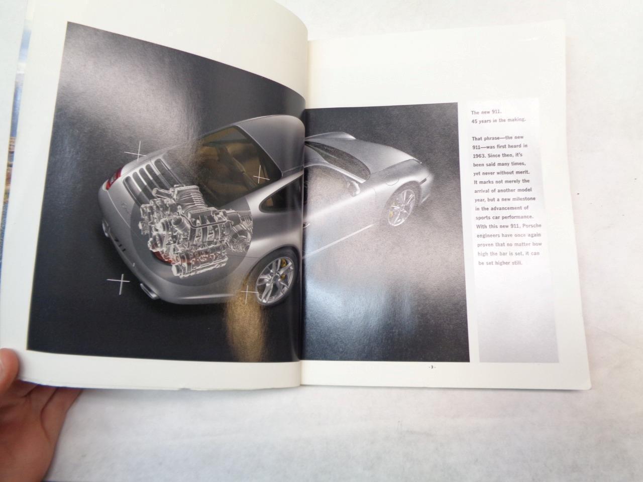 USED PORSCHE PAPERBACK BROCHURE "THE NEW 911" 2008 MKT 001 135 08 R25