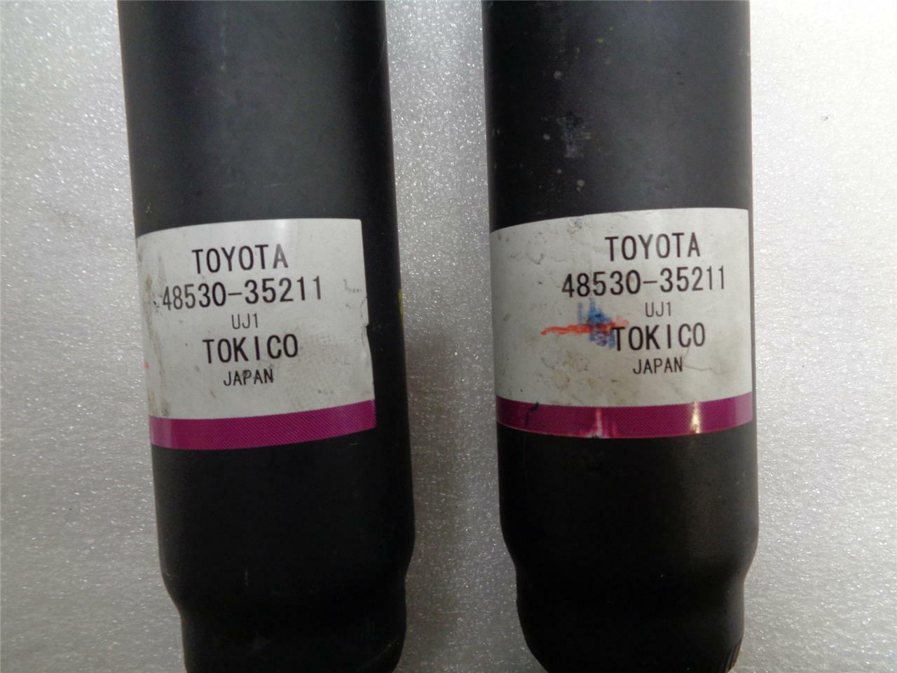 NEW SET OF GENUINE TOYOTA SHOCKS '09-'14 FJ CRUISER 48510-35400/48530-35211 R9