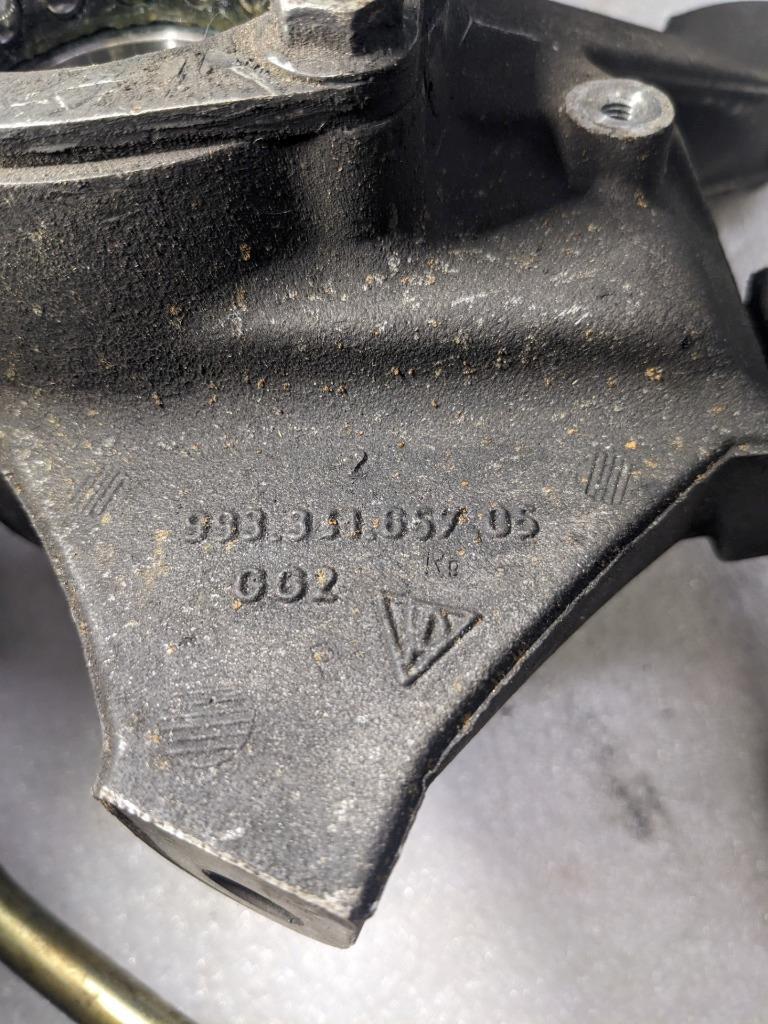 PORSCHE 993 OEM DRIVER SIDE STEERING KNUCKLE 99334165705 USED R20