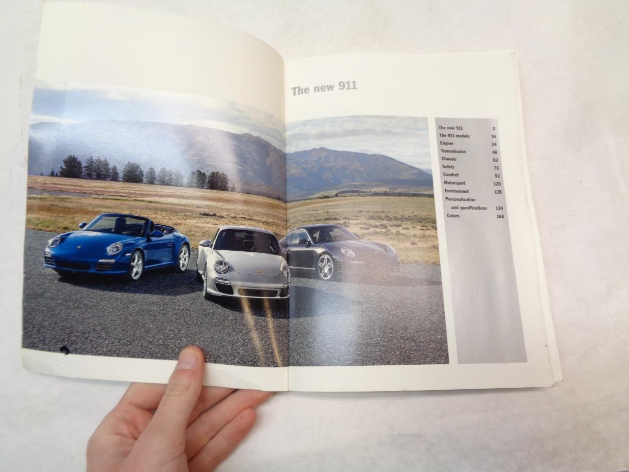 USED PORSCHE PAPERBACK BROCHURE "THE NEW 911" 2008 MKT 001 135 08 R25