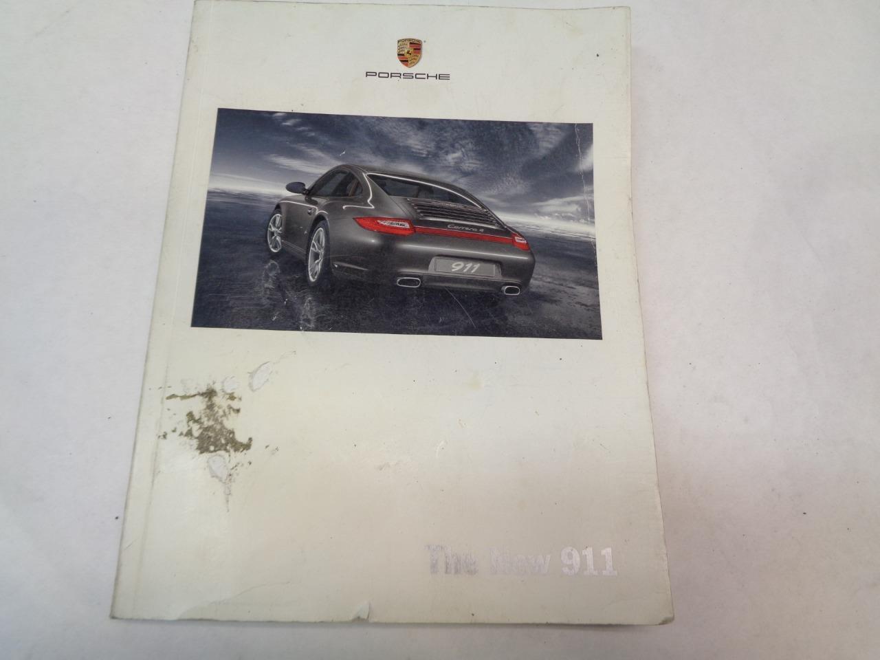 USED PORSCHE PAPERBACK BROCHURE "THE NEW 911" 2008 MKT 001 135 08 R25