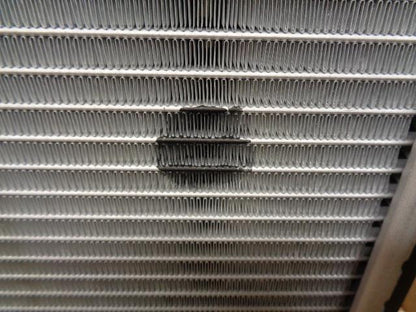 NEW 1999-2008 BMW RADIATOR BEHR RAX087 17-11-9-071-519 99000053 W/ BLOTCH SR