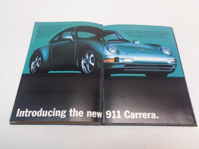 Porsche 911 "The New Carerra" Hardcover Brochure WVK 127 121 94 Genuine R25
