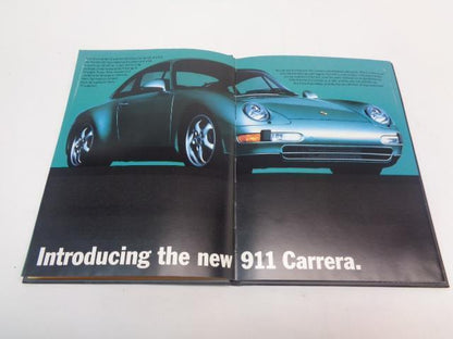Porsche 911 "The New Carerra" Hardcover Brochure WVK 127 121 94 Genuine R25