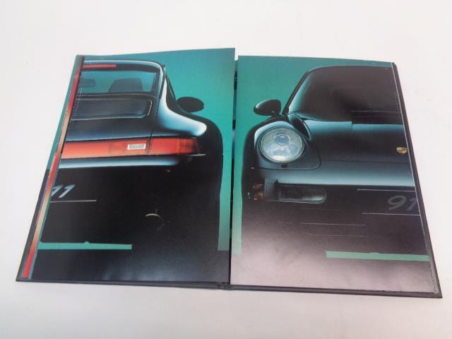 Porsche 911 "The New Carerra" Hardcover Brochure WVK 127 121 94 Genuine R25