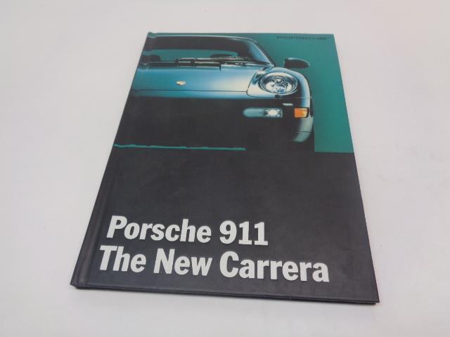 Porsche 911 "The New Carerra" Hardcover Brochure WVK 127 121 94 Genuine R25