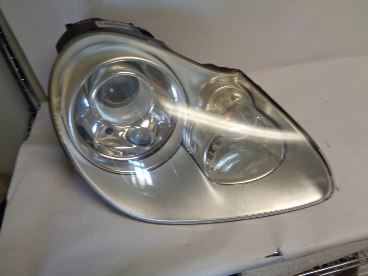 PORSCHE CAYENNE RIGHT HID HEADLIGHT 7L5 941 030 AA W/ MOUNTING BRACKET USED R31