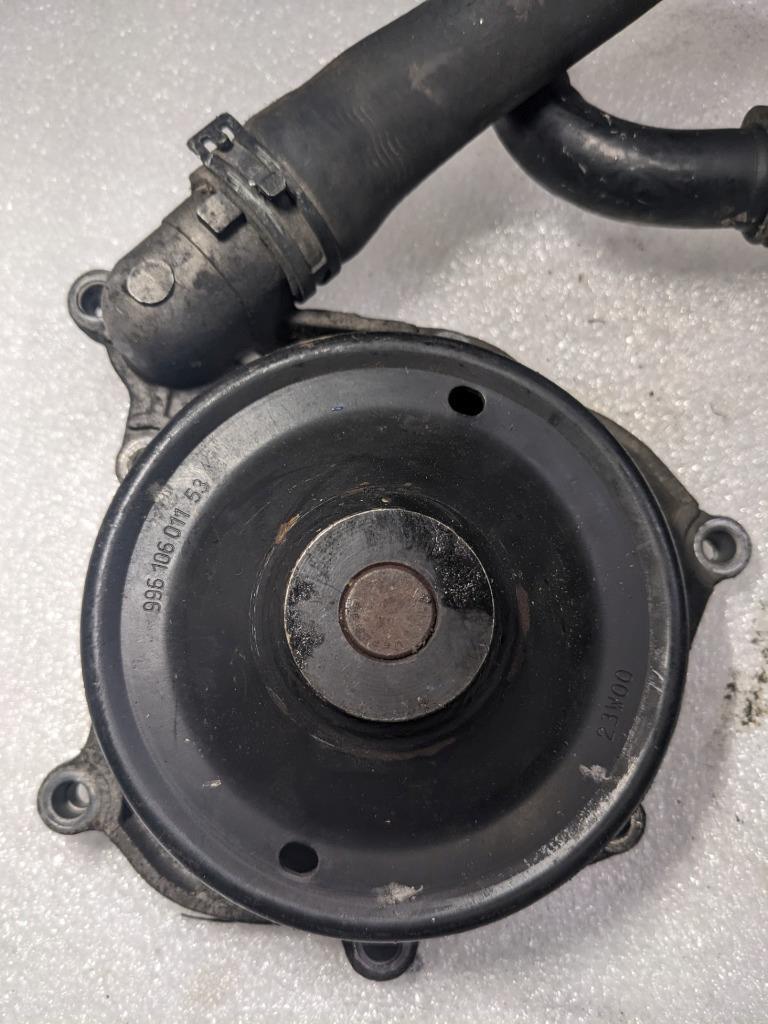 PORSCHE 911 997 BOXSTER CAYMAN ENGINE WATER PUMP W HOSES 99710601106 USED R20