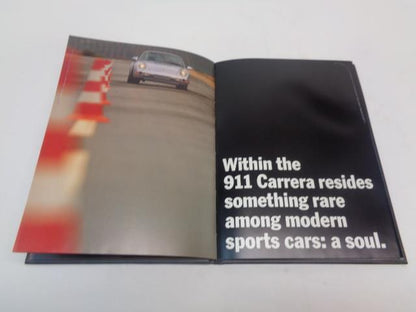 Porsche 911 "The New Carerra" Hardcover Brochure WVK 127 121 94 Genuine R25