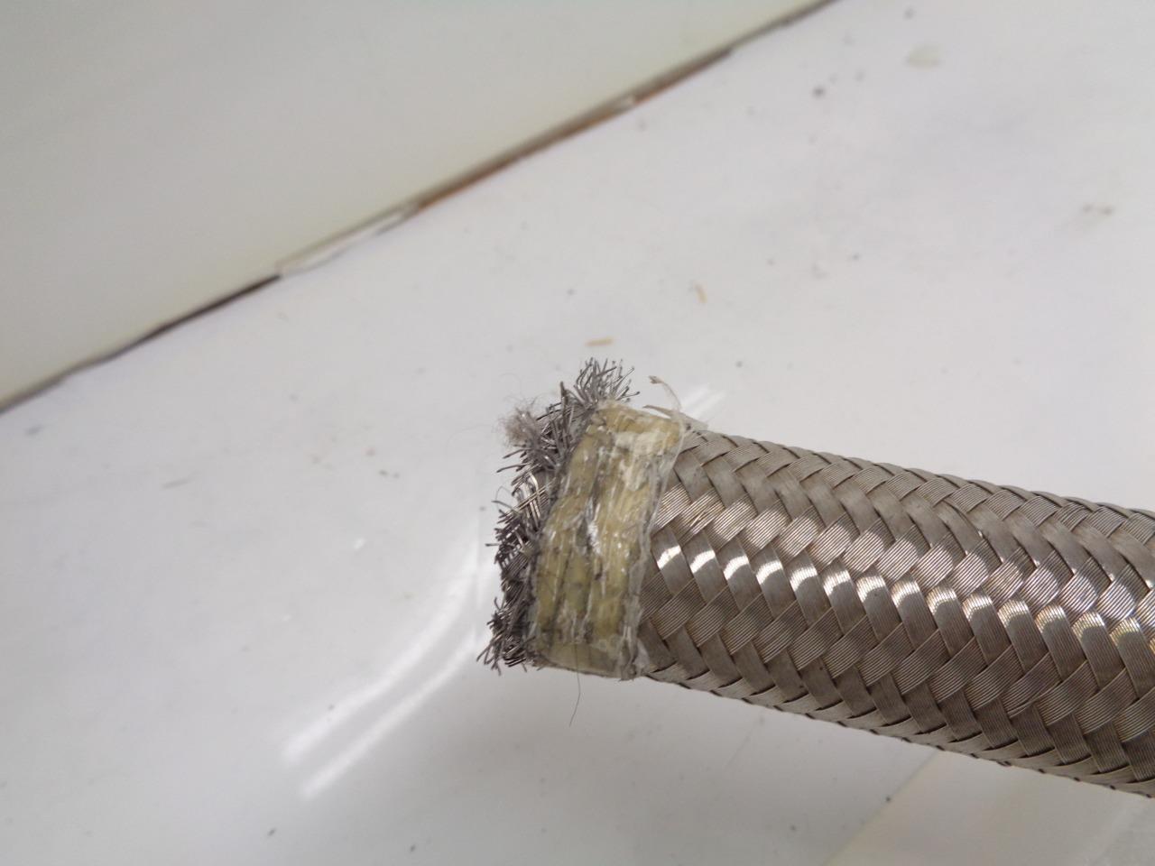 NEW UNBRANDED BRAIDED HOSE 1-1/8" (O.D) APPROXIMATELY 150 FEET & 6 INCHES R3