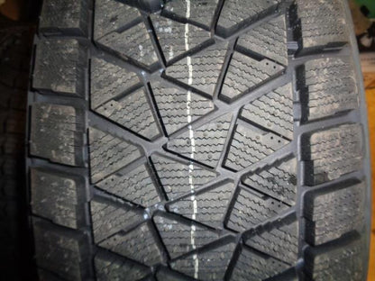 4 BRIDGESTONE BLIZZAK DM-V2 P 245 60 20 107S SL TIRES 005852