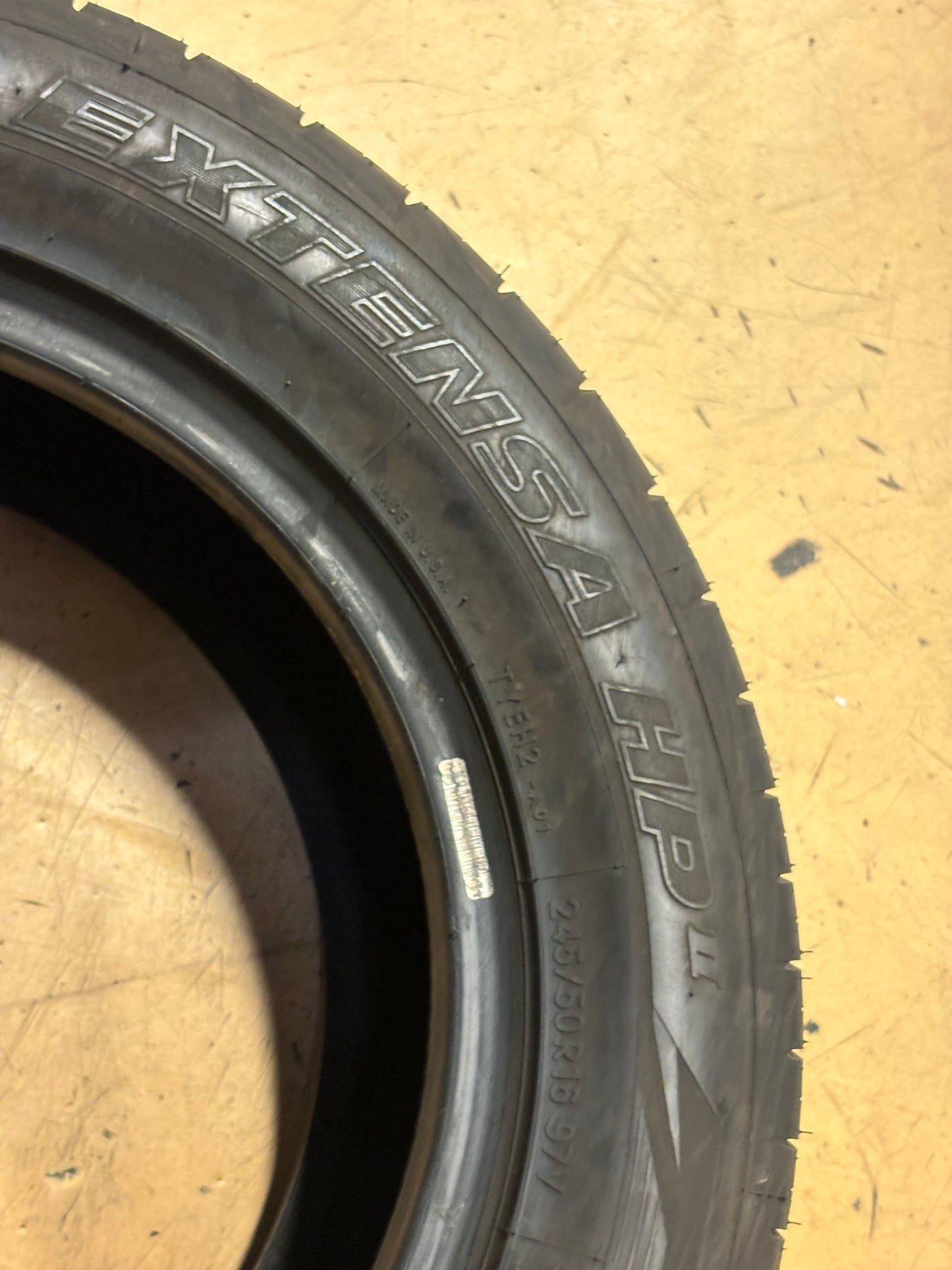 USED 9/32" OF 9.6/32" OS TOYO EXTENSA SPORT II 245 50 16 97V SL TIRE 196460 DEALER TAKE OFF ALL SEASON