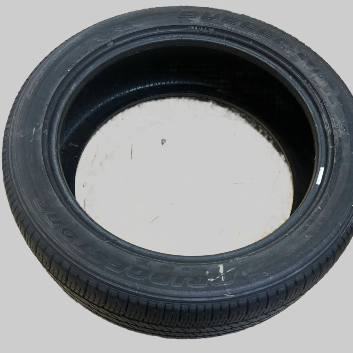 USED BRIDGESTONE DUELER LTH P 285 45 22 110H SL ALL SEASON TIRE 009627 10/32"