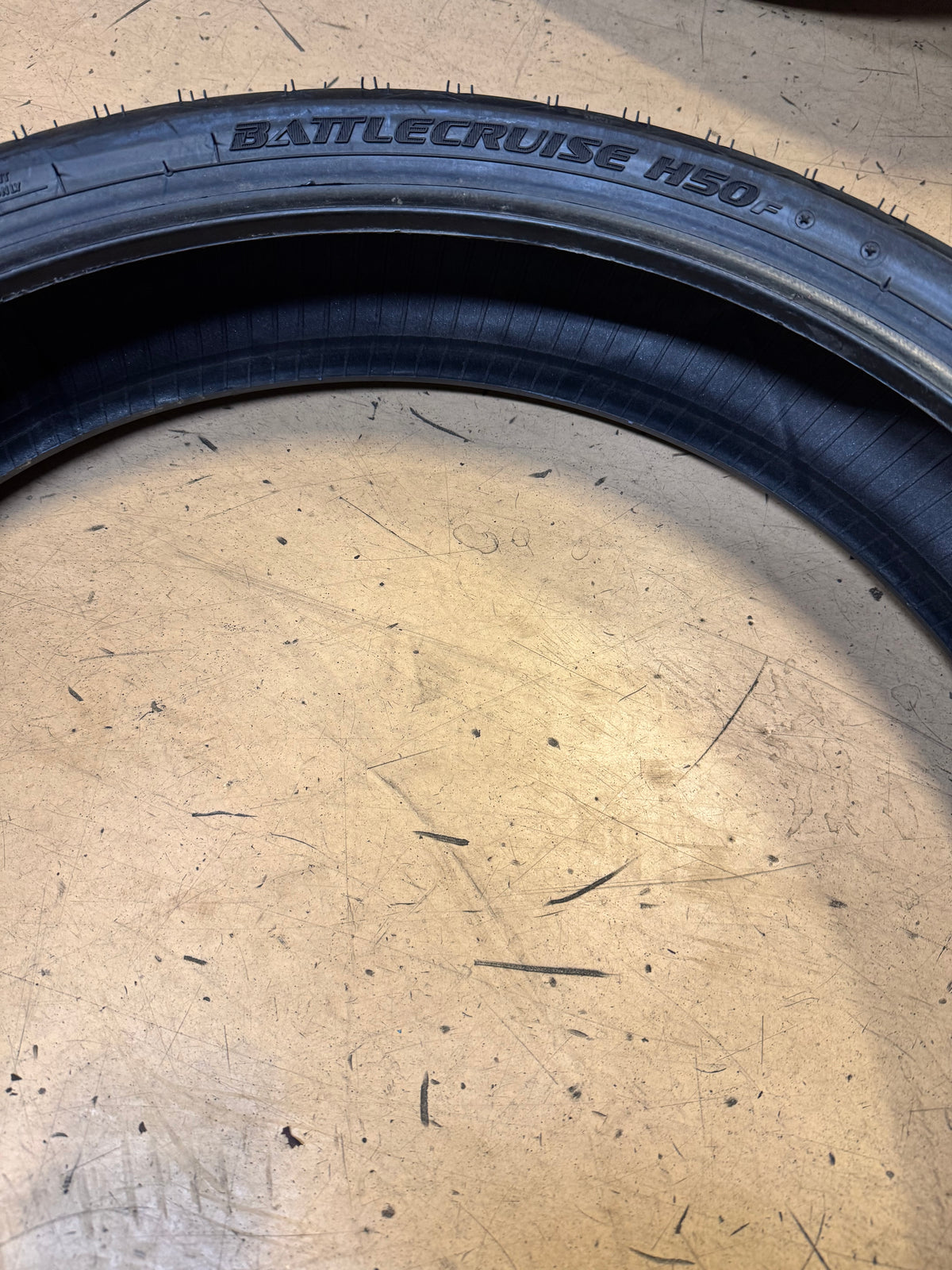 BRIDGESTONE BATTLECRUISE H50 BSW 130 60 21 63H FRONT MOTORCYCLE TIRE 009090