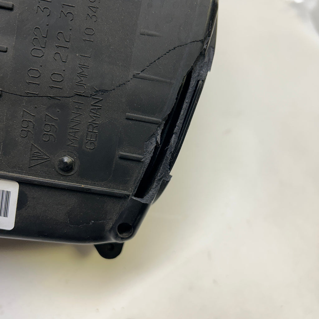 PORSCHE AIR FILTER AND HOUSING ASSEMBLY SLIGHT DAMAGE SHOWN  99711002231