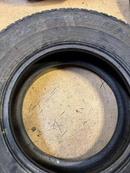 NOS DUNLOP GRANDTREK AT20 BSW P 265 70 17 113S ALL SEASON TIRE 290105041